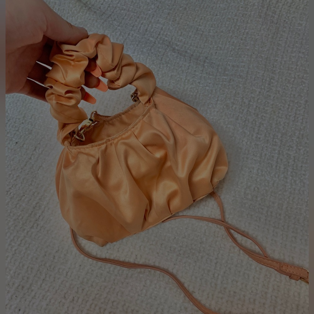 Orange adjustable strap handbag